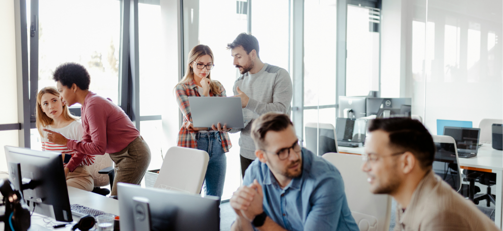 Busy employee struggling with IT issues, representing the challenges of ad-hoc tech support